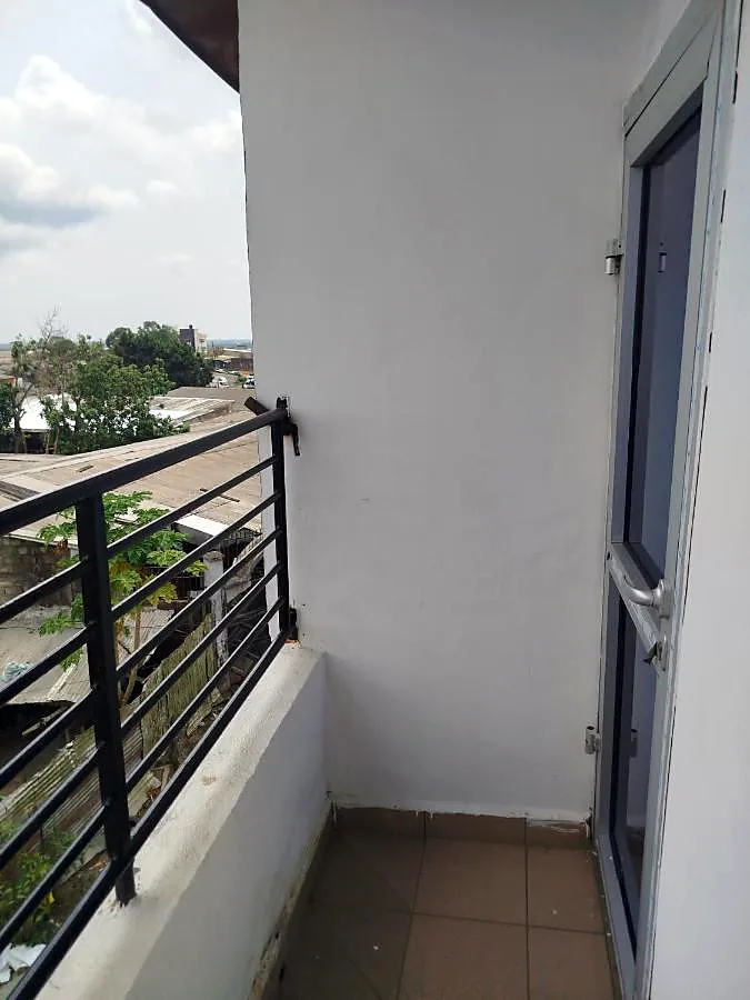 Le balcon qui dessert les chambres